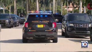 Man believed to be armed barricades himself inside Davie home