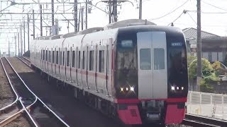 名鉄犬山線西春駅を通過する2200系の快速特急新鵜沼行き