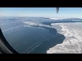 mountains and ice ravn alaska dash 8 flight from unalakleet to anchorage