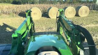 2024 Fendt 516 with CARGO Profi 4x80 loader weighing round hay bales