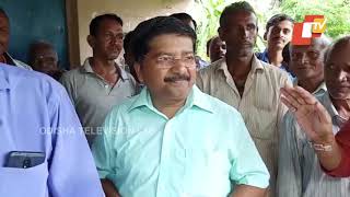 Patkura Polls- BJD MLA Atanu Nayak in queue at a booth to cast his vote