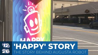 Downtown Augusta’s Happy robot helps folks ‘smile at each other’