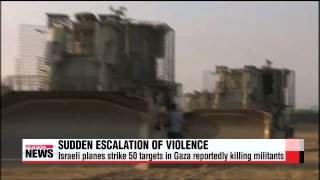 Israel pushes troops near Gaza border amid fresh air strikes