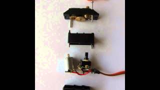 Hot wire tension mechanism with servo-motor