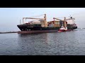 big ship traveling towards sea from ajman port 4k