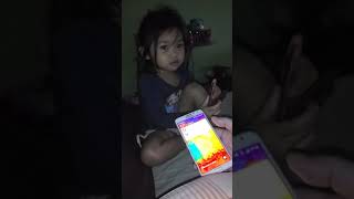 Cute asian little Lao girl speaks Lao