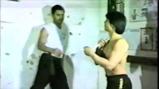 Wing Chun Master breaks chopsticks on his throat - Internal energy demonstration