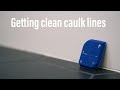 Clean caulk lines with caulking tool