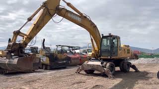 Excavadora en Neumáticos Marca John Deere modelo 210CW