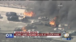 Vehicles go up in flames as wildfire sweeps across freeway