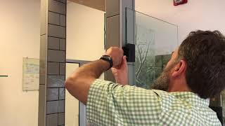 How to fix a popping or clicking sound coming from a frameless door hinge.