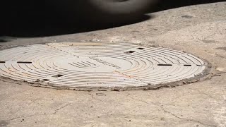 Woman dies after falling into uncovered manhole