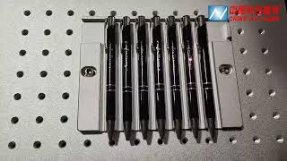 OVLaser-JPT MOPA 60W laser marking machine with a pen fixture for marking ballpoint pens.