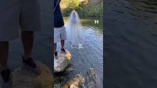 Throwing a cast net into a creek!