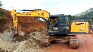 Young woman skillfully operates an excavator in rural Kenya