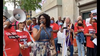 Toronto labour council president, Andria Babbington speaks at the rally at Fairmount Royal York.