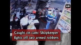 Caught on cam: Shopkeeper fights off two armed robbers - Haryana News