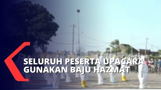 Gelar Upacara HUT ke-76 RI di Tempat Isolasi Terpusat, Seluruh Peserta Pakai Baju Hazmat