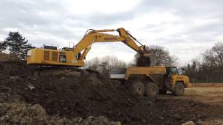 Komatsu PC600 loading Komatsu HM400 - Feidt [1080p]