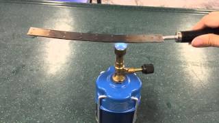 Heating a bimetallic strip