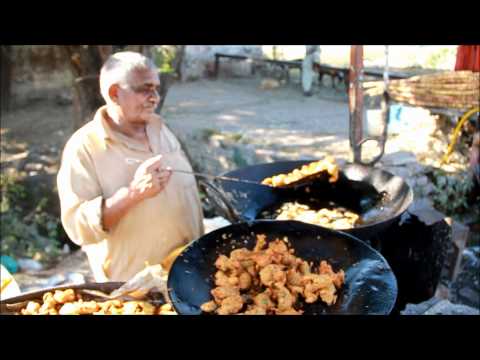 Chinese Food Cooking - Wok Fusion at a local market in India Chinese Food Cooking - Wok Fusion at a local market in India