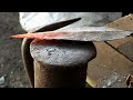 blacksmith forged a zulu iklwa out of rusted rebar