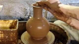 Making an Olla :  A self watering plant roots irrigation pot.