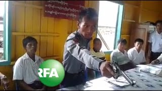 Gun-waving police officer goes viral in Myanmar