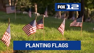 Scouts plant flags for 130,000 veterans at Willamette National Cemetery
