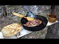 Cooking Bannock, Chicken, and Bacon Over a Campfire