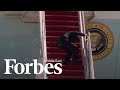 President Biden trips going up the stairs of Air Force One
