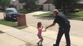 Detective Takes Time From Break to Play Hopscotch With Local Child