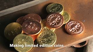 Stamping custom coins with a flypress