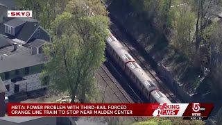 Disabled MBTA train in Malden prompts temporary service disruptions