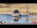 Porsche 911 Dakar wading through water