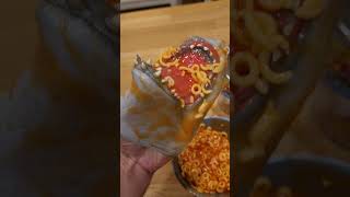 Hungry Hand eats Spaghettios!