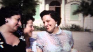 1954: 50's style Italian American love sunny day in urban park. ROME, ITALY