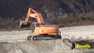 Doosan DX300 Excavator Loading Volvo and Daf Trucks