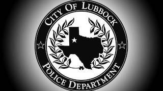 911 audio from Lubbock car dealership reporting body in trunk
