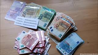 Counting a stack of euro banknotes