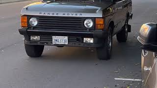 1989 Range Rover Classic loaded onto truck in San Francisco