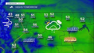 Partly to mostly cloudy, breezy, and mild on Tuesday