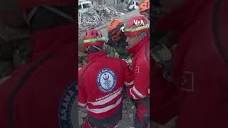 Girl Pulled to Safety in Turkey as Rescuer Weeps #shorts  | VOA News
