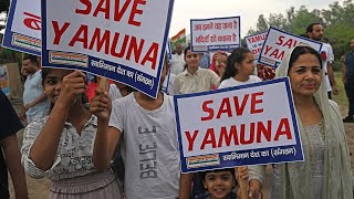 hundreds join human chain calling to save heavily polluted Yamuna