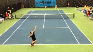 Sam Groth hits a ball *through* the net