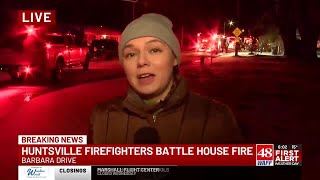 Huntsville firefighters battle house fire