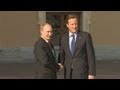 Vladimir Putin shakes hands with Cameron and Obama at G20 Summit