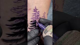 Forest around the hand tattoo