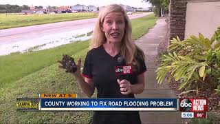 Neighbors worry as Ruskin road floods, large potholes open up