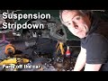 Removing the broken suspension components from the MG Midget